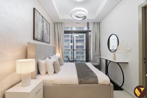 Luxury Apartment, Balcony, Pool View | In-room safe, iron/ironing board, cribs/infant beds, free WiFi