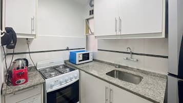 Apartamento, 1 quarto, para fumantes, sacada | Parte interna