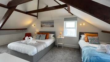 Habitación familiar, vista al mar | Wifi gratis