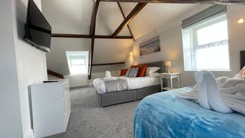 Habitación familiar, vista al mar | Wifi gratis