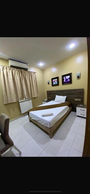 Quarto solteiro conforto | Wi-Fi de cortesia