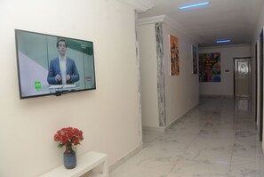 Habitación, 1 habitación, balcón, vista al jardín | Sala de estar