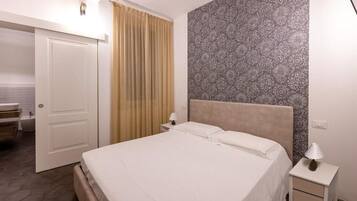 Blackout drapes, iron/ironing board, free WiFi