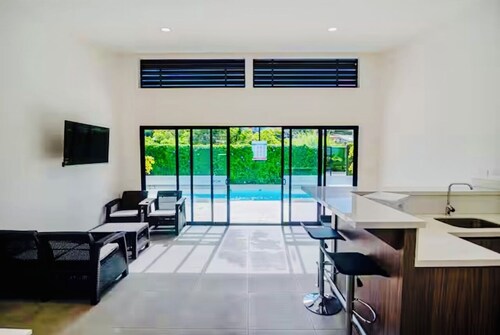 Modern 3-BR Condo • AC • Minutes from Airport SJO & City Mall