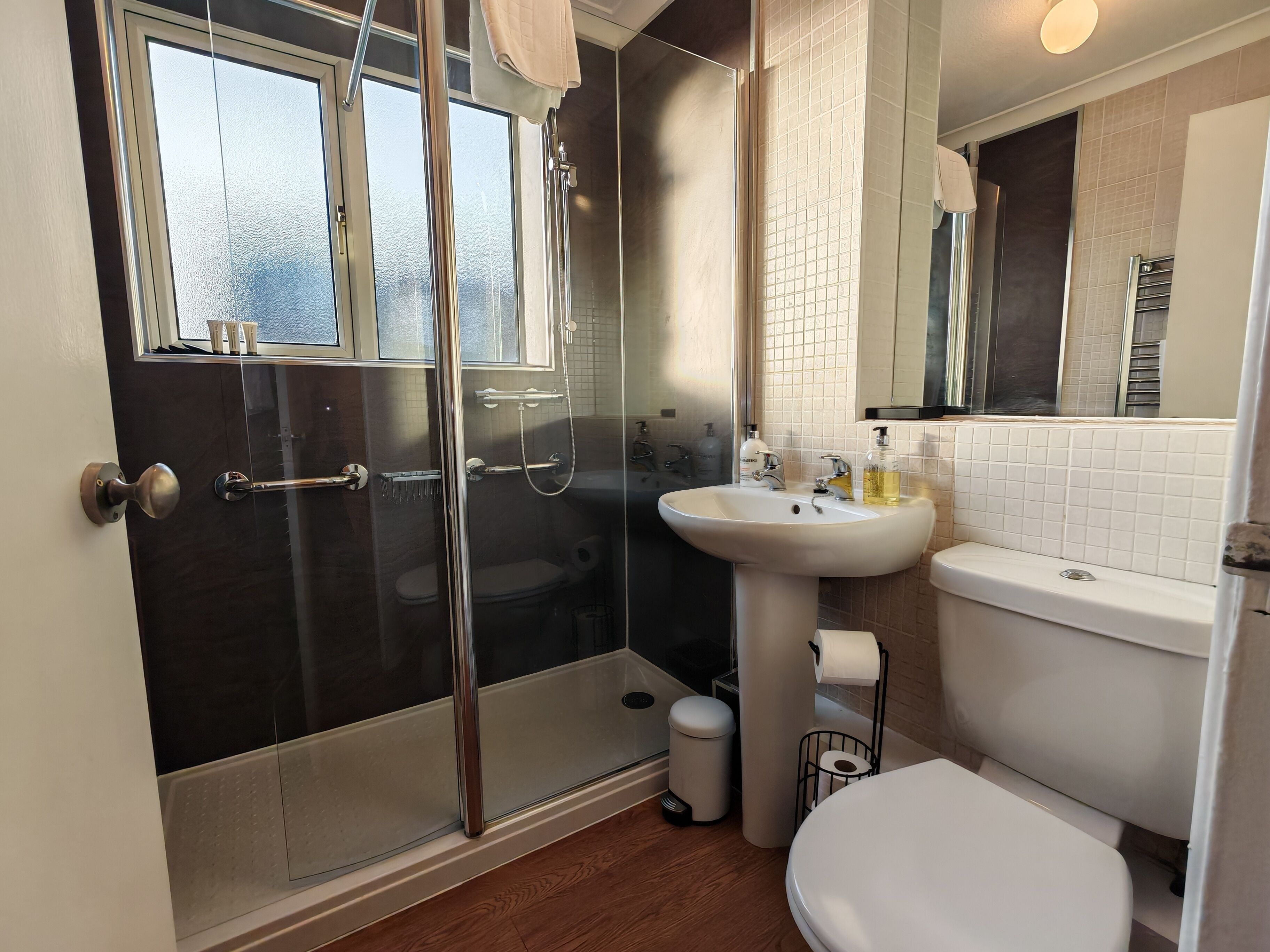 Shower, hair dryer, towels, soap
