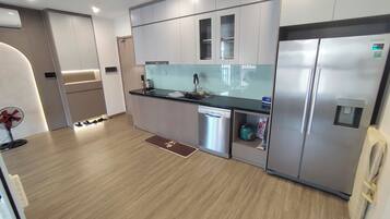 Family Apartment, Balcony, Garden View | Private kitchen | Full-size fridge, microwave, oven, stovetop