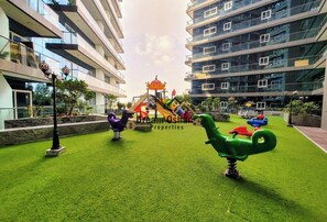 Children’s area - 1-bedroom apartment with AC in fabulous Dubai location (Dubai)