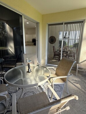 Outdoor dining - Tarpon Cove Escape—Spacious 3BR, Garage, Pools & Minutes to Gulf Beaches (Naples)