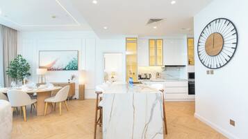 Luxury Apartment, Sea View | Private kitchen | Full-sized fridge, microwave, oven, stovetop