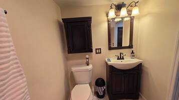 Shower, towels, soap, toilet paper