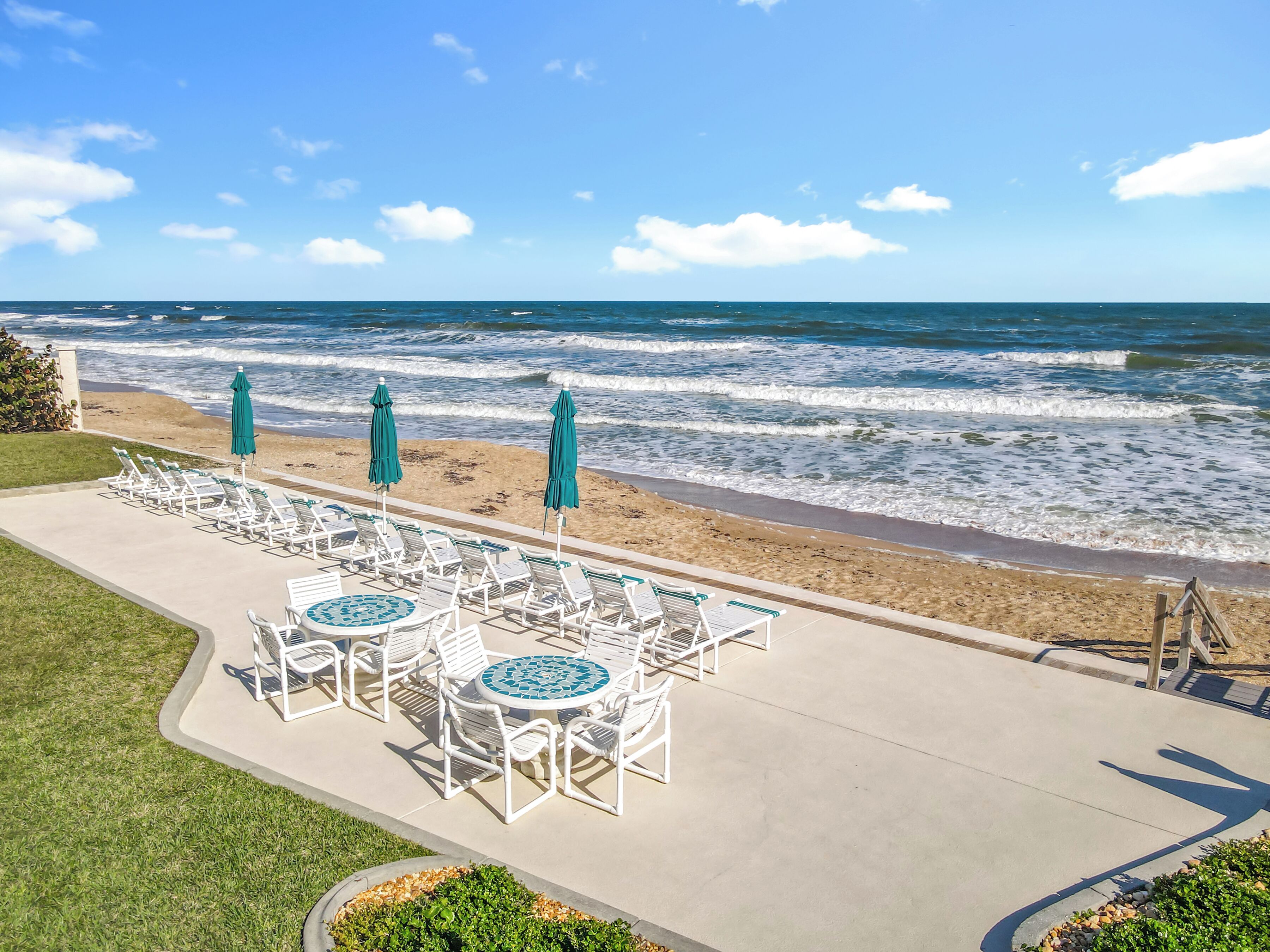 On the beach, sun-loungers, beach towels