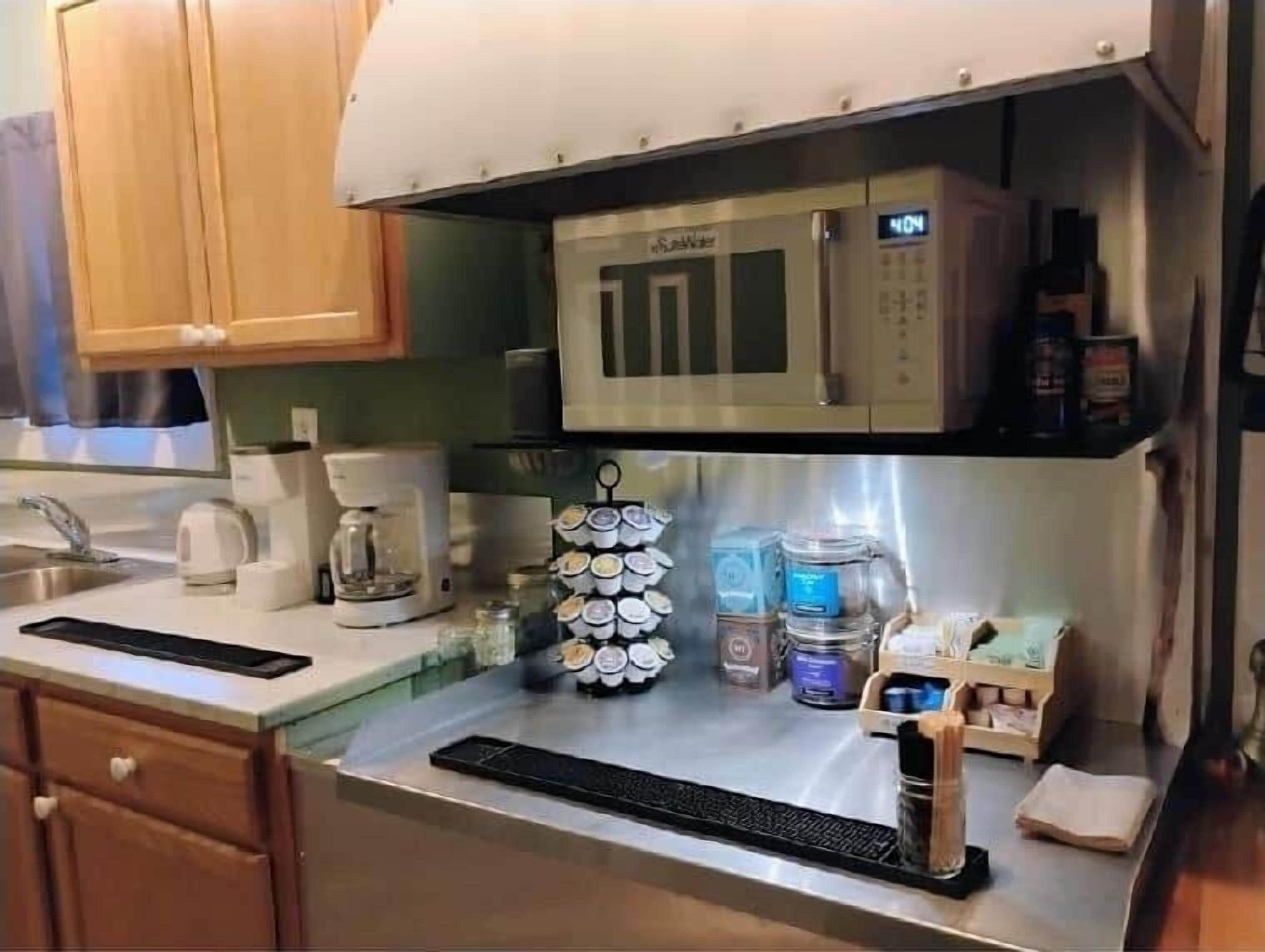 Fridge, microwave, cookware/dishes/utensils