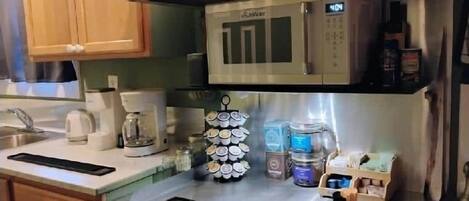 Fridge, microwave, cookware/dishes/utensils