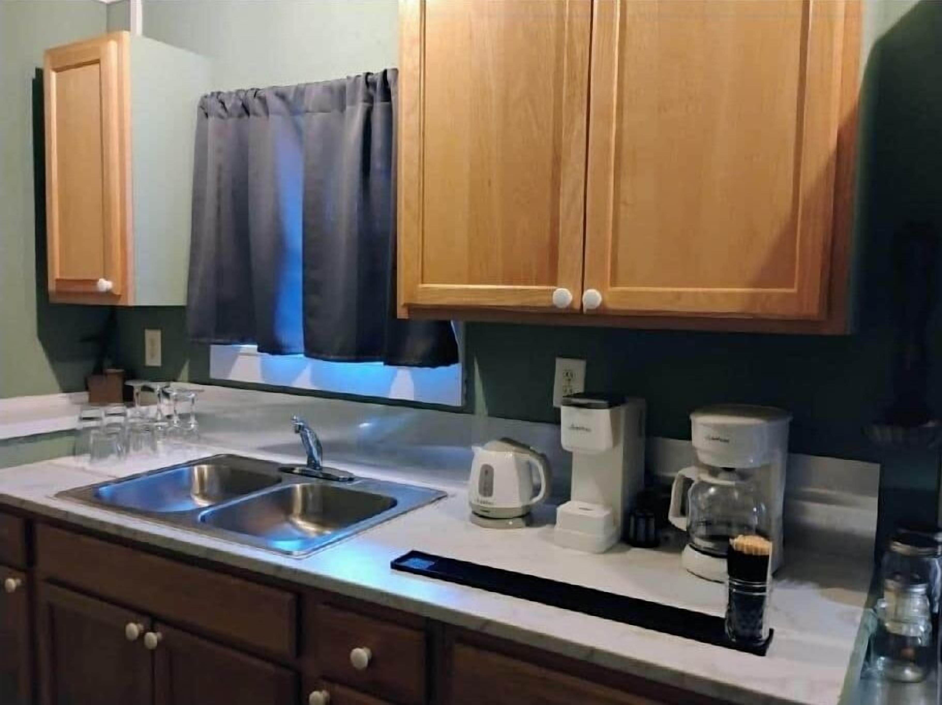 Fridge, microwave, cookware/dishes/utensils