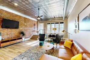 Living area - 2BR Updated Dtwn Condo: Streaming, Patio, W & D (Muncie)