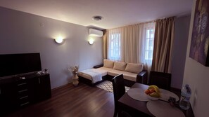 Deluxe Apartment, City View | Living area - Florimont Heights Apart Complex (Bansko)