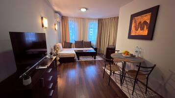 Deluxe-Apartment, Stadtblick | Wohnbereich