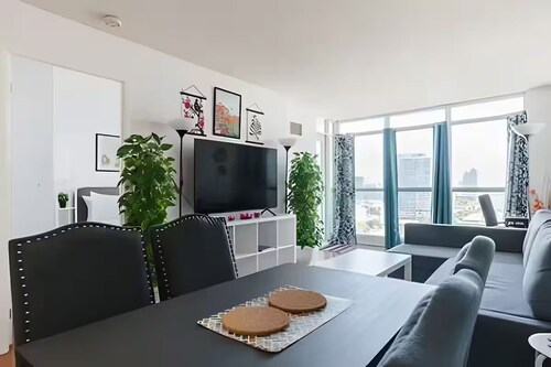 Steps to Everything: Prime Downtown Toronto 2BR/2BA with Included Parking