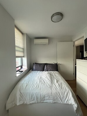 Iron/ironing board, Internet, bed sheets - Sunny 1 Bedroom Apartment in Bushwick w/ Private Terrace, Gym, Game Room (Brooklyn)