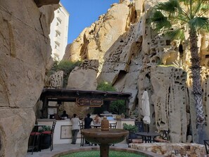 Outdoor dining - Stunning Grand Solmar master suite overlooking pools and beach! (Cabo San Lucas)