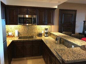 Microwave, stovetop, dishwasher - Stunning Grand Solmar master suite overlooking pools and beach! (Cabo San Lucas)