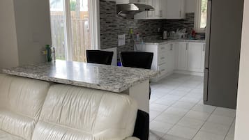 Double Room, Garden View | Living area