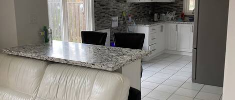 Double Room, Garden View | Living area