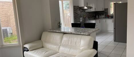 Double Room, Garden View | Living area