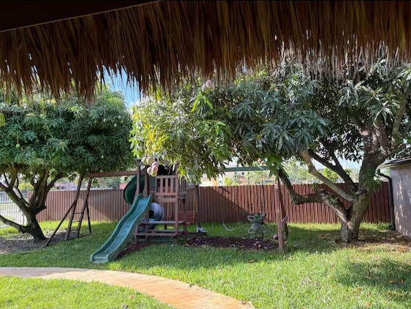 Children’s area - Modern Miami Gardens Stay Near Hard Rock Stadium at this 2 bedroom one bath home (Miami Gardens)