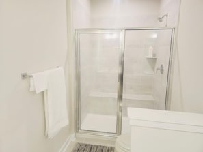 Shower, towels, soap, shampoo