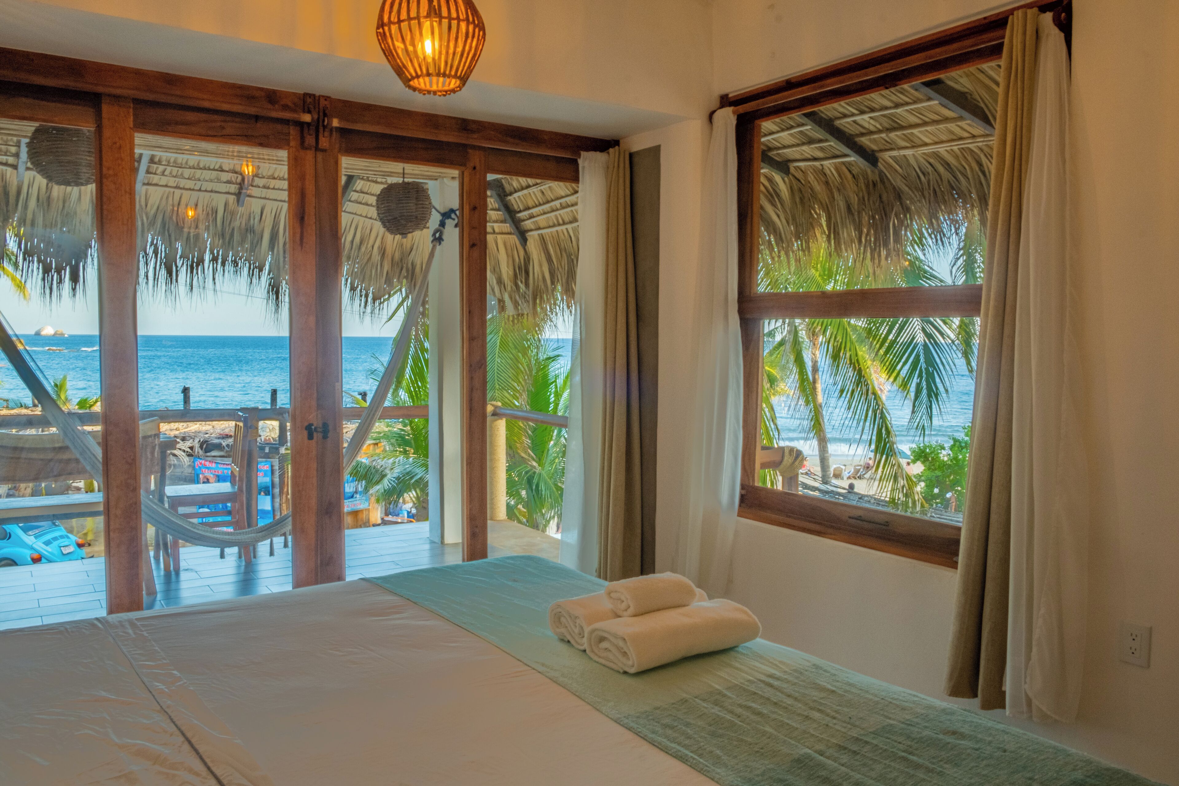 Room Four (Panoramic Room, terrace, hammock, and beach view) | In-room safe, free WiFi