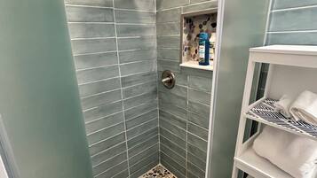 Shower, hair dryer, towels, soap