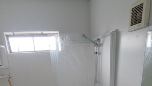 A small bathroom with a shower, a sink, and a window. - Located 5 mins drive from the town.  Pets are not allowed. (Te Awamutu)