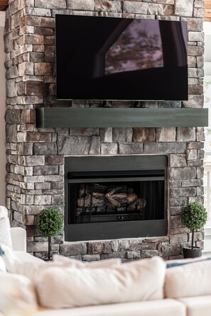 Smart TV, fireplace, table tennis, books