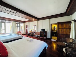 Deluxe Quadruple Room, Courtyard View | Premium bedding, Select Comfort beds, free minibar items, desk