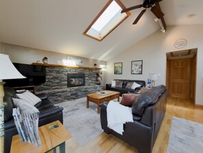 Smart TV, fireplace, DVD player, books