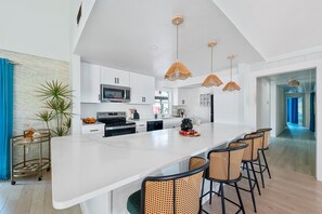 Fridge, microwave, oven, stovetop - 7BR Coastal Retreat: Heated Pool | Hot Tub | Games (Bradenton)