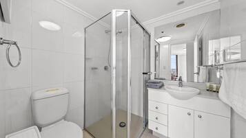 Shower, hair dryer, towels, soap