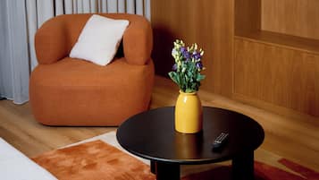 Departamento Deluxe, balcón | Área de sala de estar