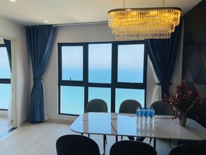 Panoramic Apartment, Balcony, Beach View | Living area | 55-inch flat-screen TV with digital channels - Apartment With Balcony (Nha Trang)