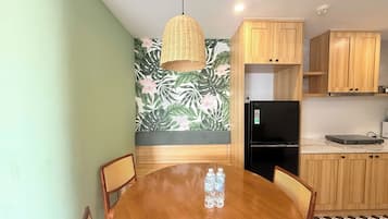 Executive Apartment, 2 Bedrooms, Balcony, Ocean View | Living area | 55-inch flat-screen TV with digital channels