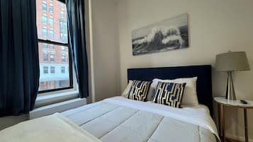 2 slaapkamers, een strijkplank/strijkijzer, reisbedje, gratis wifi