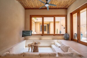 Luxury Villa, 1 Bedroom, Patio, Pool View | Living room | 40-inch TV with cable channels - Villa Tierra 1 Uluwatu (Uluwatu)