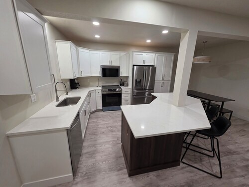 Luxury 3 Bedroom, 2 Bath Basement Apartment. Family and pet friendly!