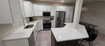 Luxury 3 Bedroom, 2 Bath Basement Apartment. Family and pet friendly!