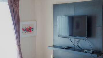 Suite, balcon, vue ville | Wi-Fi gratuit