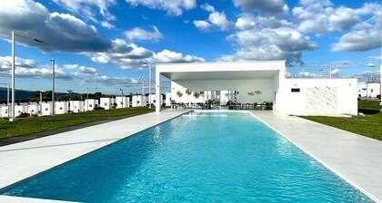 Cozy 2-bedroom house in peaceful Conacaste with AC