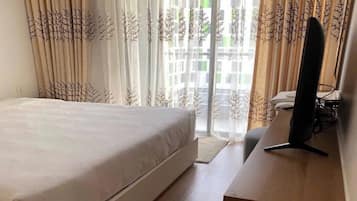 Suite Grand, 1 habitación, con acceso al salón lounge del club, vista a la alberca | Sábanas de algodón egipcio, ropa de cama de alta calidad y edredón