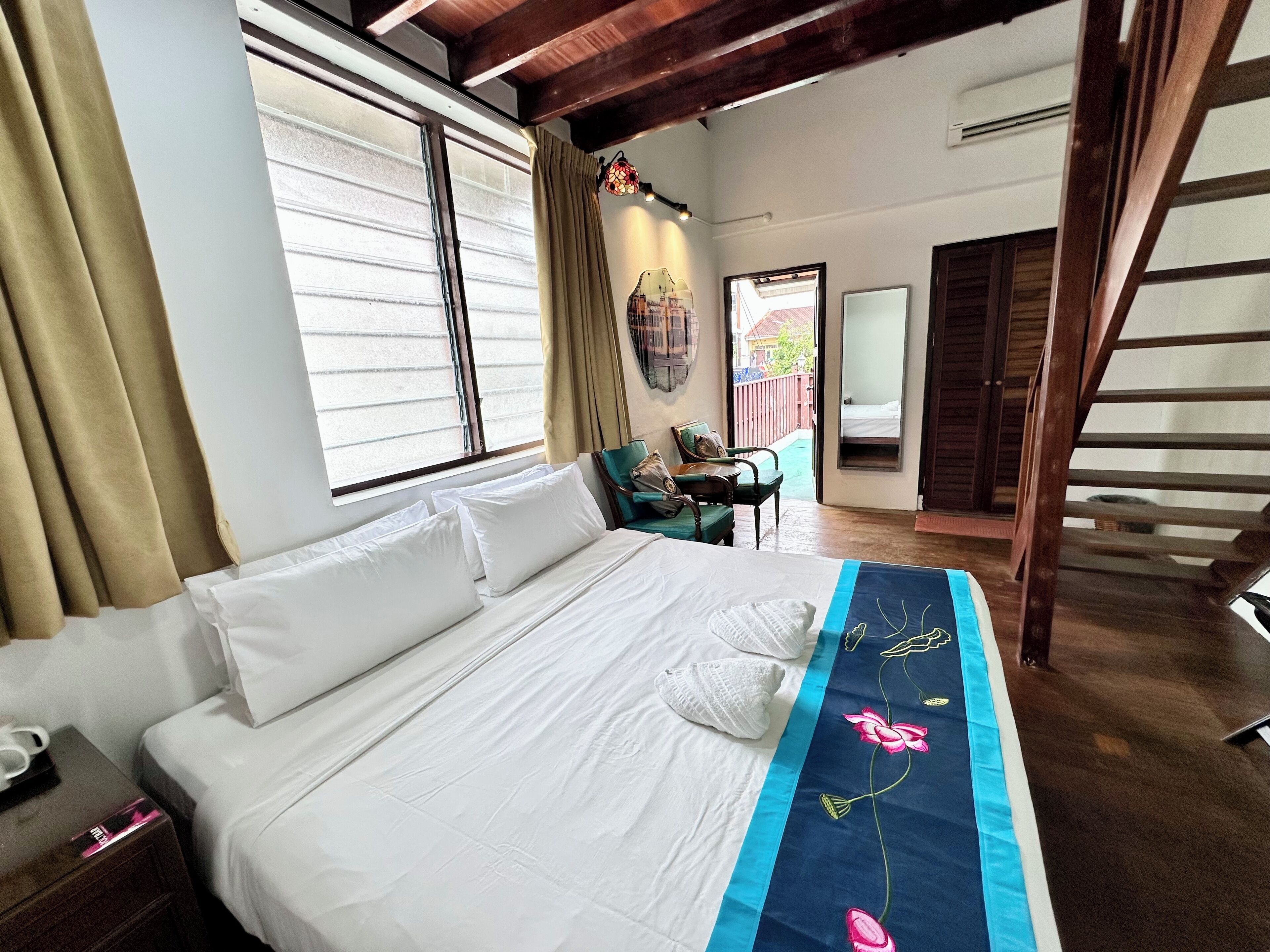 Family Room, Balcony, City View | Free WiFi