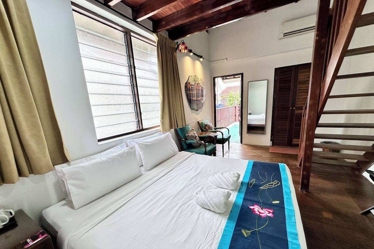 Family Room, Balcony, City View | Free WiFi